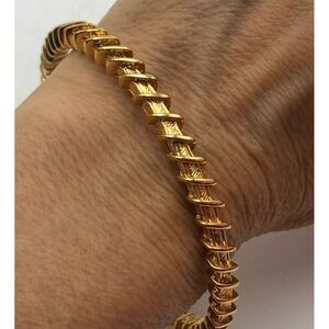 JBK Jacqueline Kennedy Gold Tone Textured Hollow Bangle Bracelet